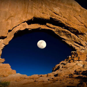 the-moon-through-north-window-arches-national-park-utah-united-states