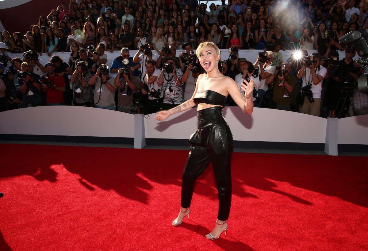 miley-cyrus-was-more-reserved-than-usual-in-this-alexandre-vauthier-black-leather-bandeau-and-harem-pant