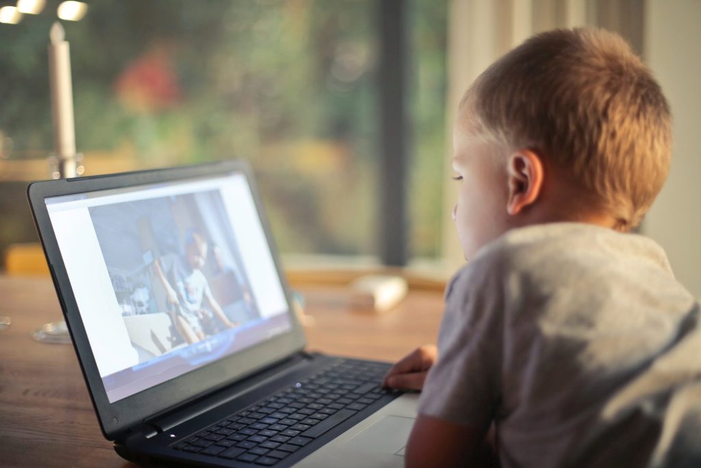boy-watching-video-using-laptop-821948-e1577089946231